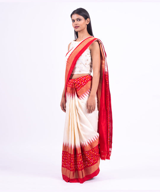 Cream red handwoven pochampally ikat saree